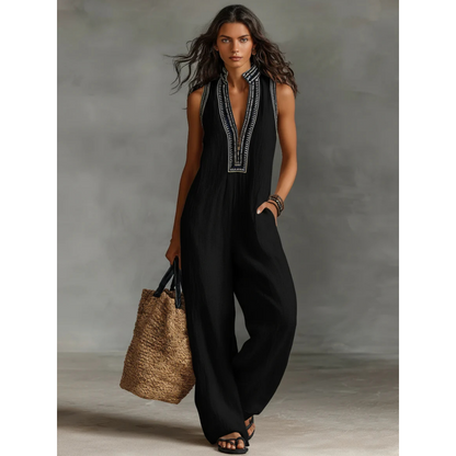 Ärmlös damjumpsuit med V-ringning och vida ben