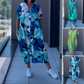 👗49% RABATT! 🌸 Elegant V-halsad Klänning med Tryck för Kvinnor – Flytande Tyg, Smickrande Passform & Perfekt för Våren ☀️