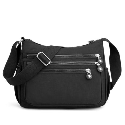 ✨60% RABATT NU! ✨Lätt crossbody-väska i nylon med flera fickor