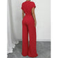 🔥 60% RABATT på utvalda produkter🎉Elegant jumpsuit med asymmetrisk halsringning och prickmönster