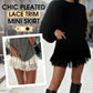 🎀Chic plisserad minikjol med spetskant – hög midja, lekfulla veck & romantisk elegans 👗🕊️